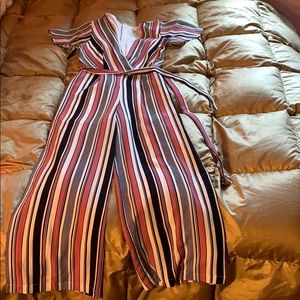 Monteau deep V, split leg, striped jumpsuit!